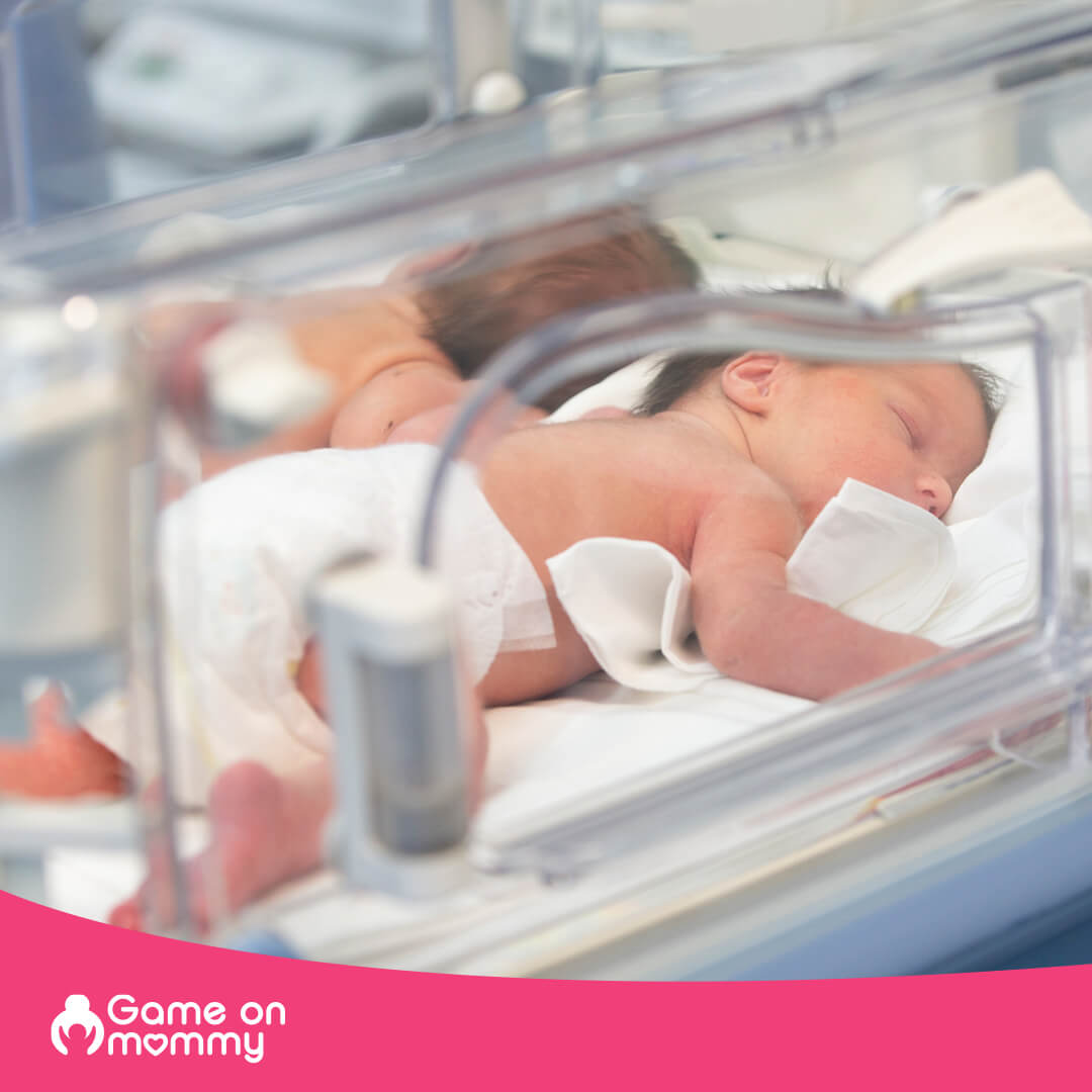 premature twin babies in incubator